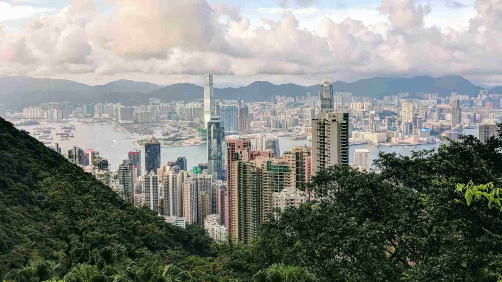 How do urban living and rural living compare in terms of environmental impact?